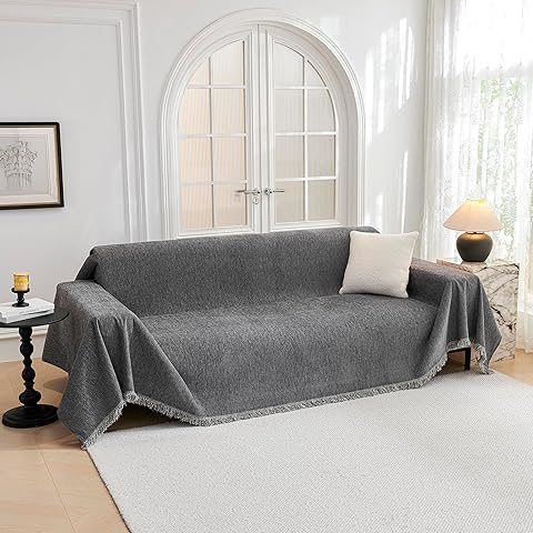 Elegant black couch cover with cushion covers for contemporary interiors
