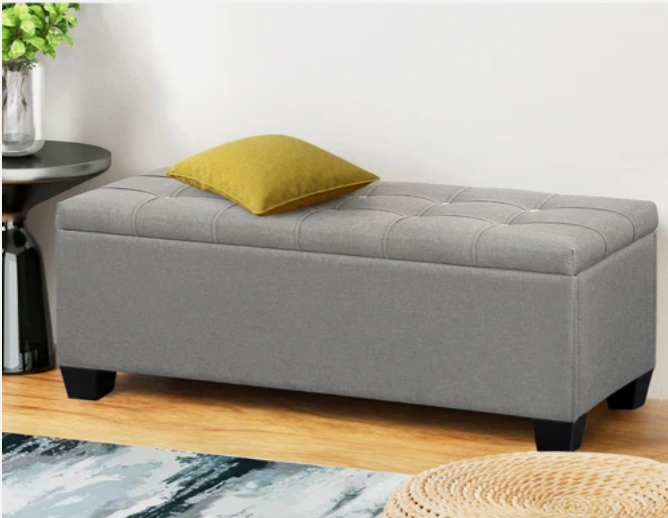 Modern grey ottoman with removable lid and storage inside