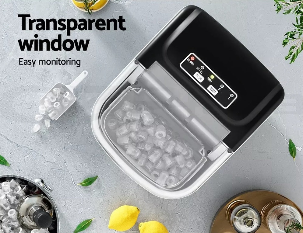 Portable ice maker showing removable ice basket and scoop for easy serving