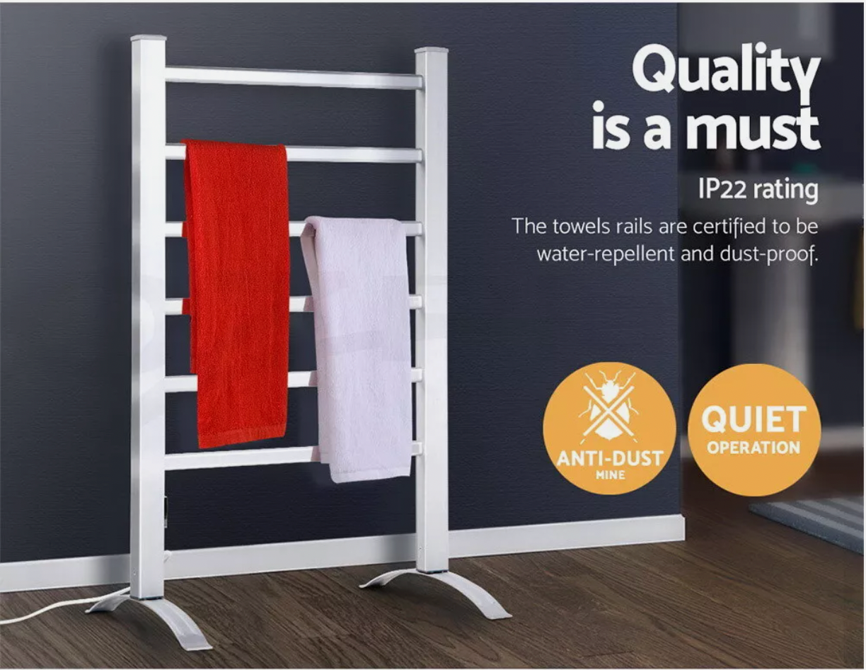 Heated towel rail with warm towels displayed in bathroom